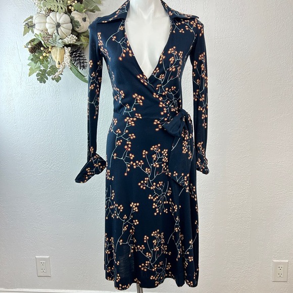 Diane Von Furstenberg Dresses & Skirts - "First Bloom" Diane Von Furstenberg Iconic Vintage Wrap dress.